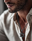 All Black Stainless Steel Star of David Necklace worn with an open linen shirt