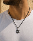 All Black Star of David Necklace worn on the chest